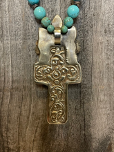 Load image into Gallery viewer, Turquoise Beaded Necklace with Bone Cross Pendant